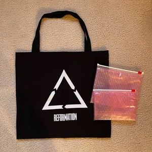 Classic pink Glossier makeup bags with a Reformation tote.